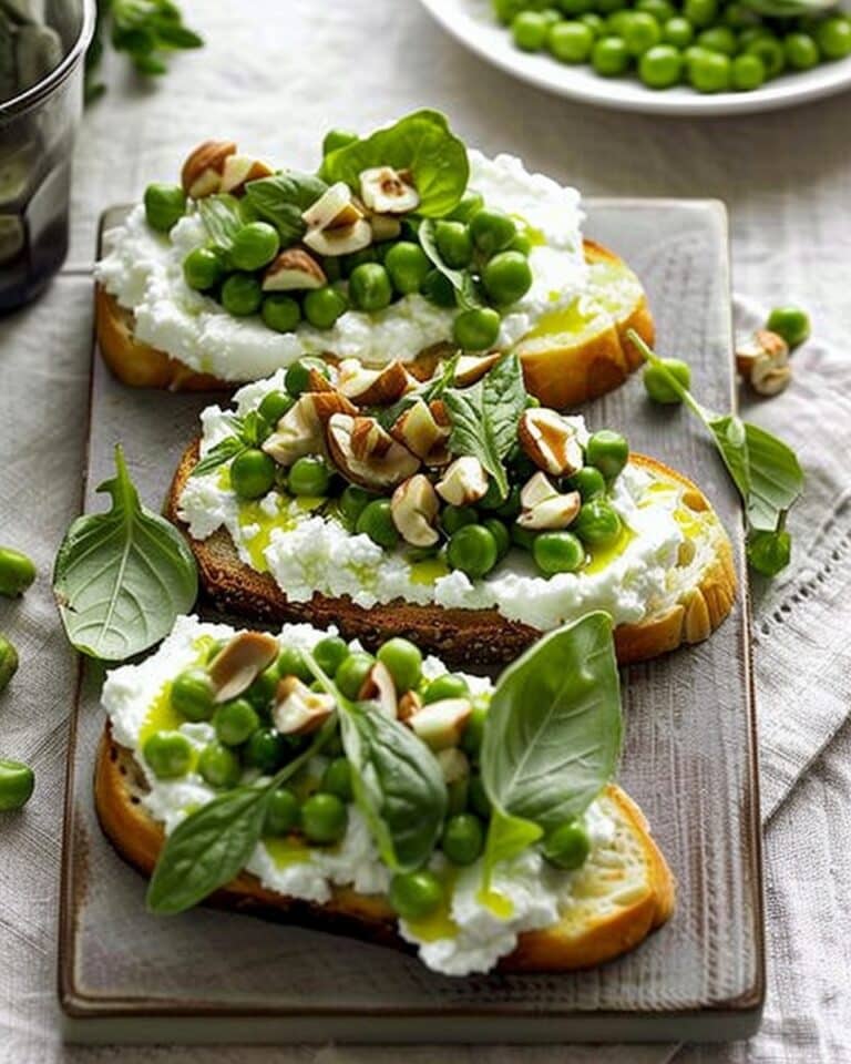 Pea Ricotta Crostini With Hazelnuts