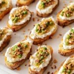 Pea Ricotta Crostini With Hazelnuts