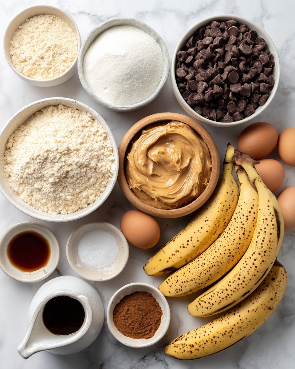 The image shows a white bowl filled with light beige almond flour on the bottom right. Next to it on the lower left is a smaller white bowl of pale coconut flour. A small white bowl of white baking soda is above the coconut flour. A tiny white bowl with some salt sits between these bowls and a wooden bowl of creamy almond or peanut butter, which is smooth and light brown in color. Above the butter is a larger white bowl filled with shiny dark chocolate chips. To the right side, there are three ripe bananas together, yellow with many brown spots. Scattered around are two brown eggs, a small glass with dark brown vanilla extract, a white bowl with brown cinnamon powder and a white bowl with white baking powder. In the front left is a small white jug with dark maple syrup inside. The background is a white marbled surface. photo taken with an iphone --ar 4:5 --v 7