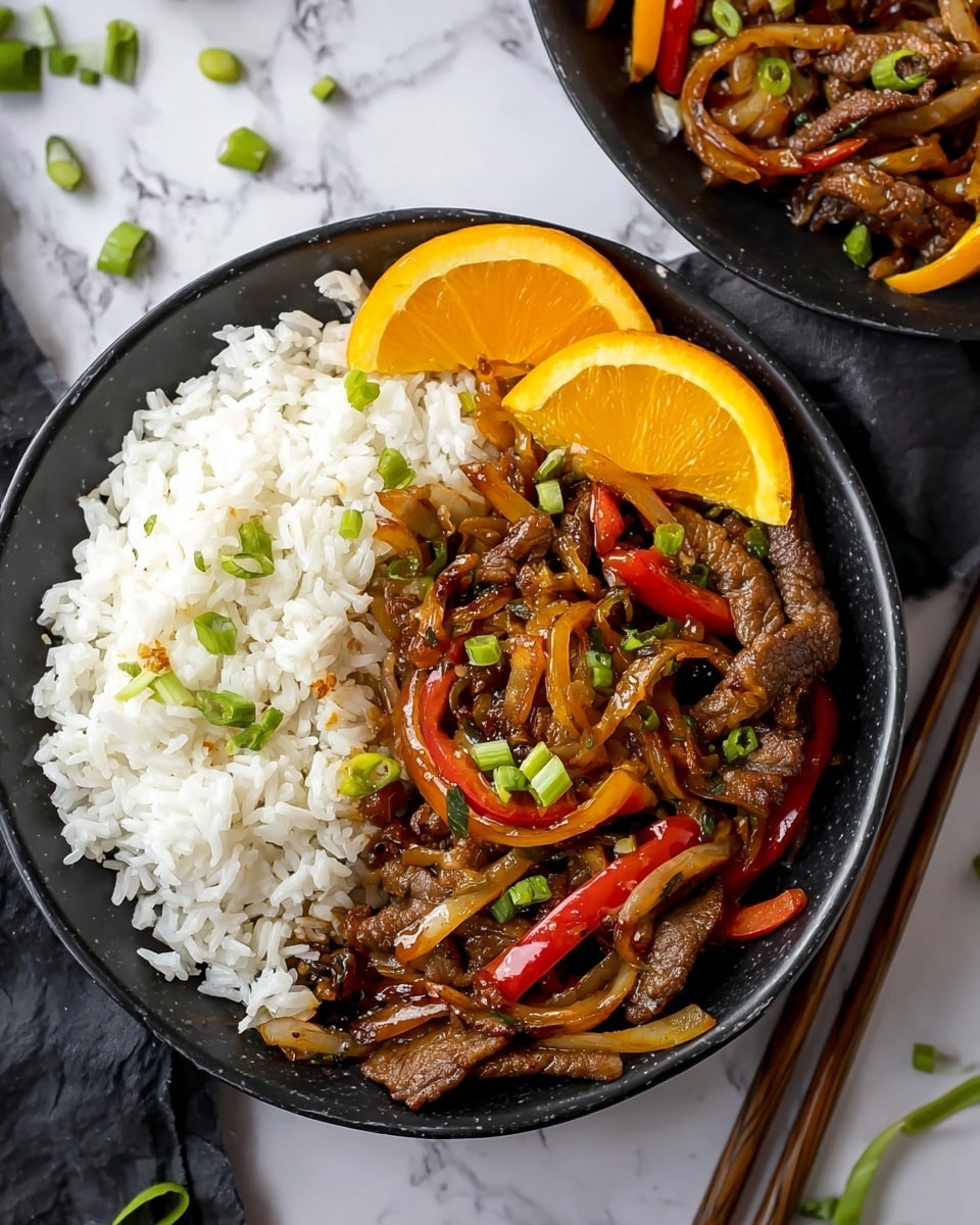 The dish is served in a black bowl filled with three main layers. The first layer on one side is white, fluffy rice with a soft texture. The second layer next to it has dark brown strips of cooked meat mixed with thin, curved slices of light orange onions and bright red bell pepper strips, all covered in a shiny sauce. The top layer is sprinkled with small pieces of fresh green chopped spring onions adding a fresh touch. Two bright orange wedges rest on the side of the bowl as garnish. The bowl is placed on a white marbled surface with scattered green onions and chopsticks in the background. Photo taken with an iphone --ar 4:5 --v 7