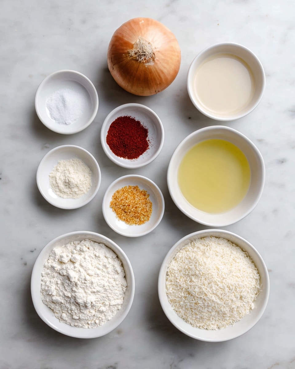 The image shows various ingredients laid out on a white marbled surface. At the top center is a whole onion with brown and creamy skin. Below it are seven small white bowls arranged in a rough circle; from left to right, they contain salt (white grains), deep red paprika powder, a fine white powder (likely baking soda or powder), and golden-yellow granules (possibly garlic powder). Below this row, two larger white bowls are placed side by side; the left one is filled with a pale beige liquid (likely buttermilk or a similar dairy product), and the right one holds a light yellow oil. At the bottom are two large white bowls; the left contains white flour with a powdery texture, and the right is filled with light beige flaky panko breadcrumbs. The overall arrangement is neat and evenly spaced. Photo taken with an iphone --ar 4:5 --v 7