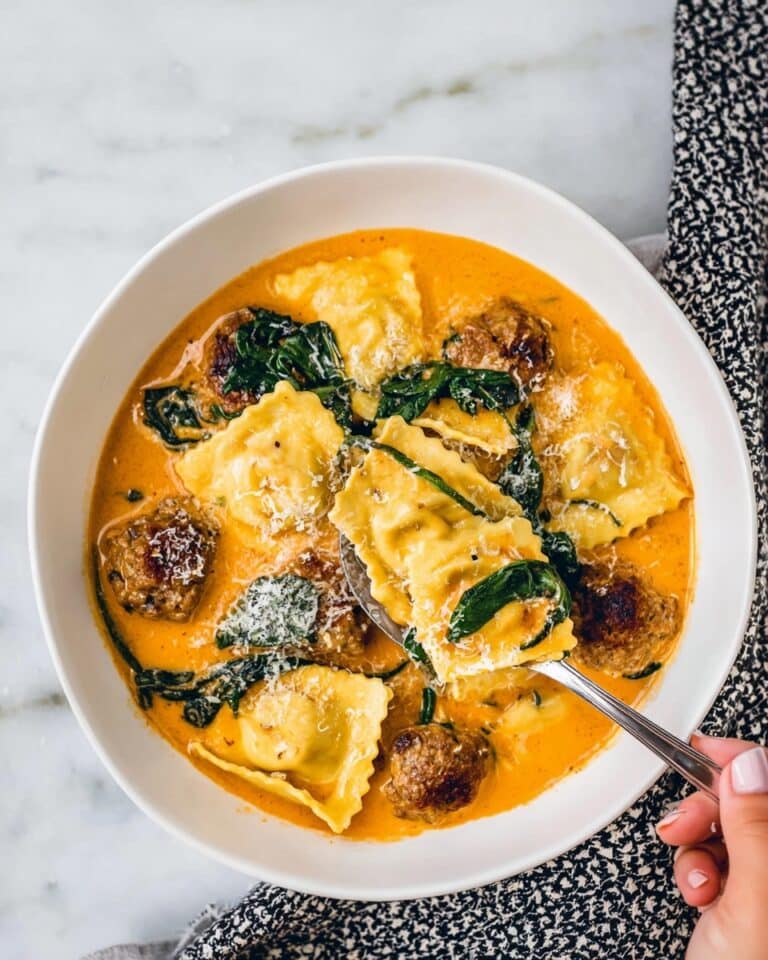 Ravioli Soup with Italian Sausage, Roasted Tomatoes, and Spinach Recipe