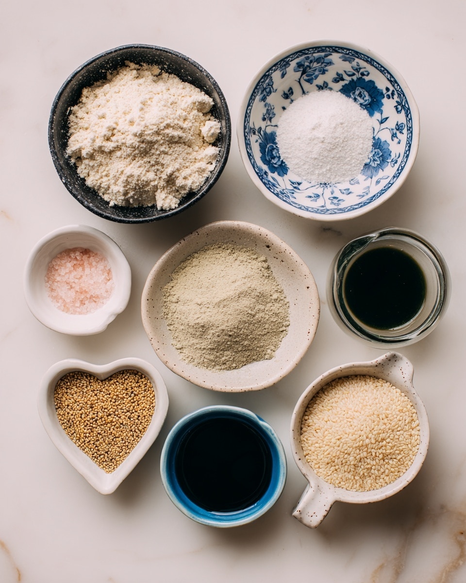 The image shows eight small bowls and containers placed on a white marbled surface, each holding a different ingredient. In the top left, a black bowl is filled with off-white chickpea flour that has a powdery texture. To its right, a white bowl with blue floral design holds white baking soda and powder. Below the chickpea flour, a frosted translucent bowl contains light tan psyllium husk powder. Underneath that, a small heart-shaped white bowl has golden ground flax seeds. Below the flax seeds, a small round white bowl holds light pink salt. On the right side of the image, a small white cup holds dark green apple cider vinegar. Beneath it, a small blue bowl contains thick, black date syrup. At the bottom right, a white measuring cup with a handle is filled with pale beige sesame seeds. photo taken with an iphone --ar 4:5 --v 7