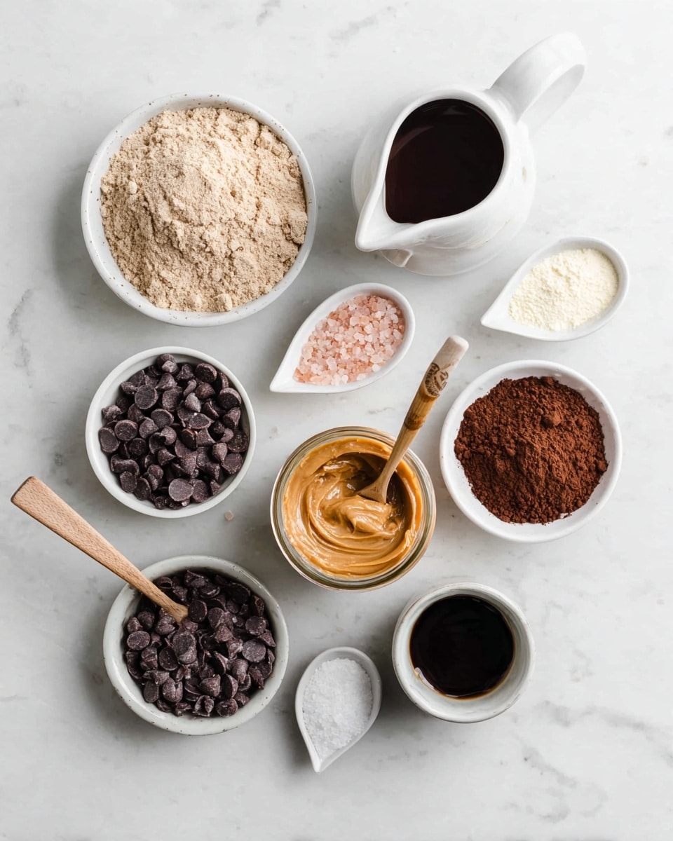 This image shows a top view of eight containers with baking ingredients arranged on a white marbled surface. At the top left is a white bowl filled with light brown powder. To the right is a white pitcher holding dark brown liquid. Below the pitcher is a small white bowl filled with a light cream powder. Next to it on the right is a white spoon holding pink salt. At the bottom left is a small spoon with coarse white salt. Above it is a white bowl filled with dark chocolate chips. In the center right is a glass jar with creamy peanut butter and a wooden spoon inside. Below it is a small white bowl filled with dark brown cocoa powder. Finally, at the bottom right is a small white cup containing a dark liquid. The arrangement is neat and evenly spaced. Photo taken with an iphone --ar 4:5 --v 7