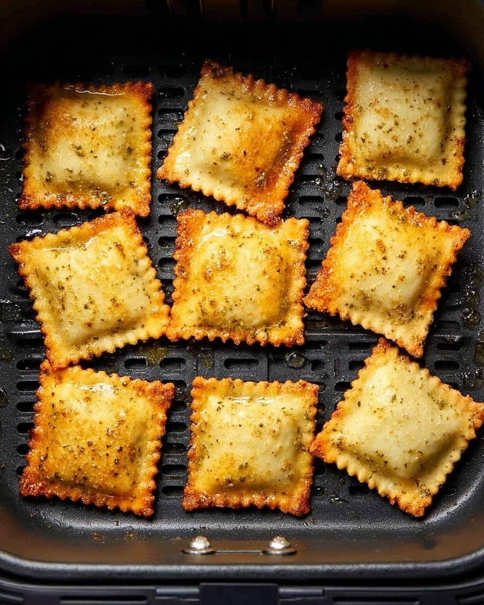 The image shows a close-up of several golden brown crispy squares with a rough, crunchy texture, sprinkled lightly with small green herb pieces. They are placed side by side on a white plate, with a small part of a shiny white bowl filled with red dipping sauce visible in the top right corner. The plate rests on a white marbled surface that adds a light, elegant background. The crispy squares have an even, golden color with darker, toasted edges and a slightly uneven crumb coating, giving them a homemade look. photo taken with an iphone --ar 4:5 --v 7