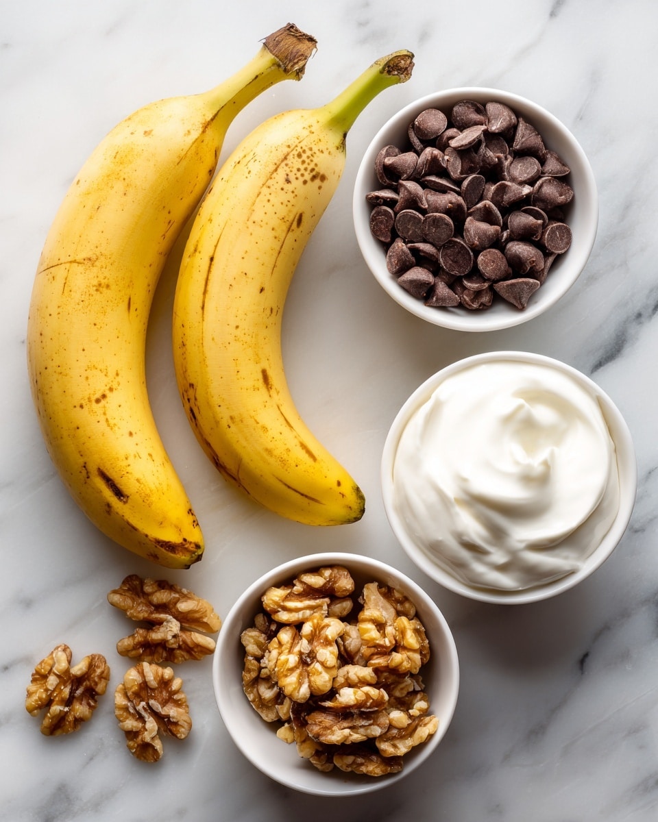 Two yellow bananas with brown spots lie on a white marbled surface, angled diagonally. Below them, three small white bowls are arranged in a loose triangle on the same surface. The top right bowl is filled with medium brown chocolate chips with a smooth, round shape. The bottom left bowl holds golden-brown walnut pieces with a rough texture, with some walnut pieces scattered on the surface nearby. The bottom right bowl contains white, creamy yogurt with a thick, soft texture. photo taken with an iphone --ar 4:5 --v 7