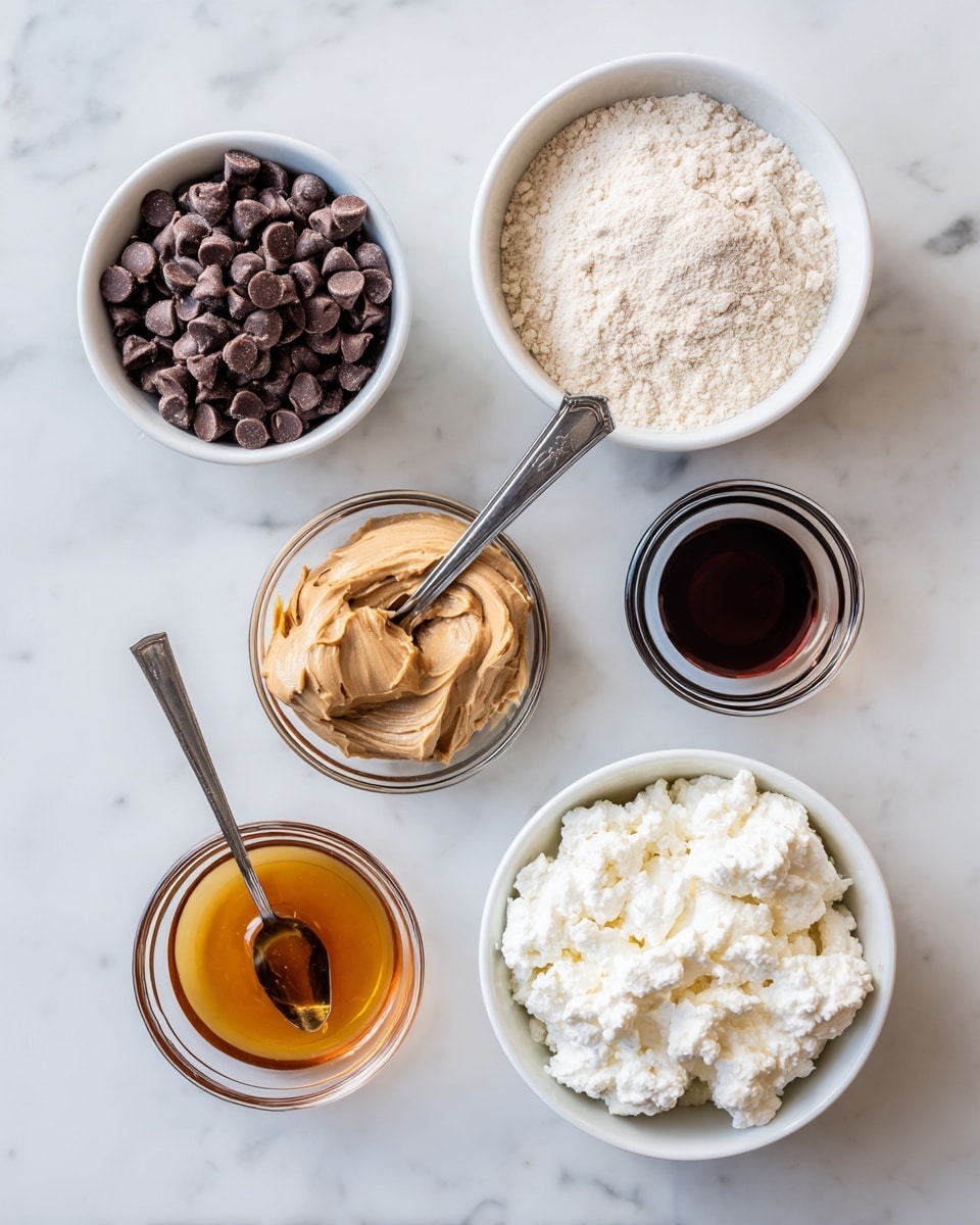 The image shows seven small white bowls and one clear glass bowl arranged neatly on a white marbled surface. From left to right, the first white bowl is filled with dark brown chocolate chips which are small and shiny. Next to it is a small clear glass bowl holding light brown peanut butter with a silver tablespoon placed inside, the handle pointing outward. Above that, there is a white bowl filled with light beige protein powder, fine and fluffy in texture. To its right, a small clear glass bowl contains dark amber vanilla extract with a smooth surface. Next is a white bowl with a deep golden-brown liquid, maple syrup, having a thick consistency. Lastly, a larger white bowl holds white cottage cheese with a lumpy and creamy texture. Each container is well spaced, and all sit on the white marbled surface under soft natural light. Photo taken with an iphone --ar 4:5 --v 7